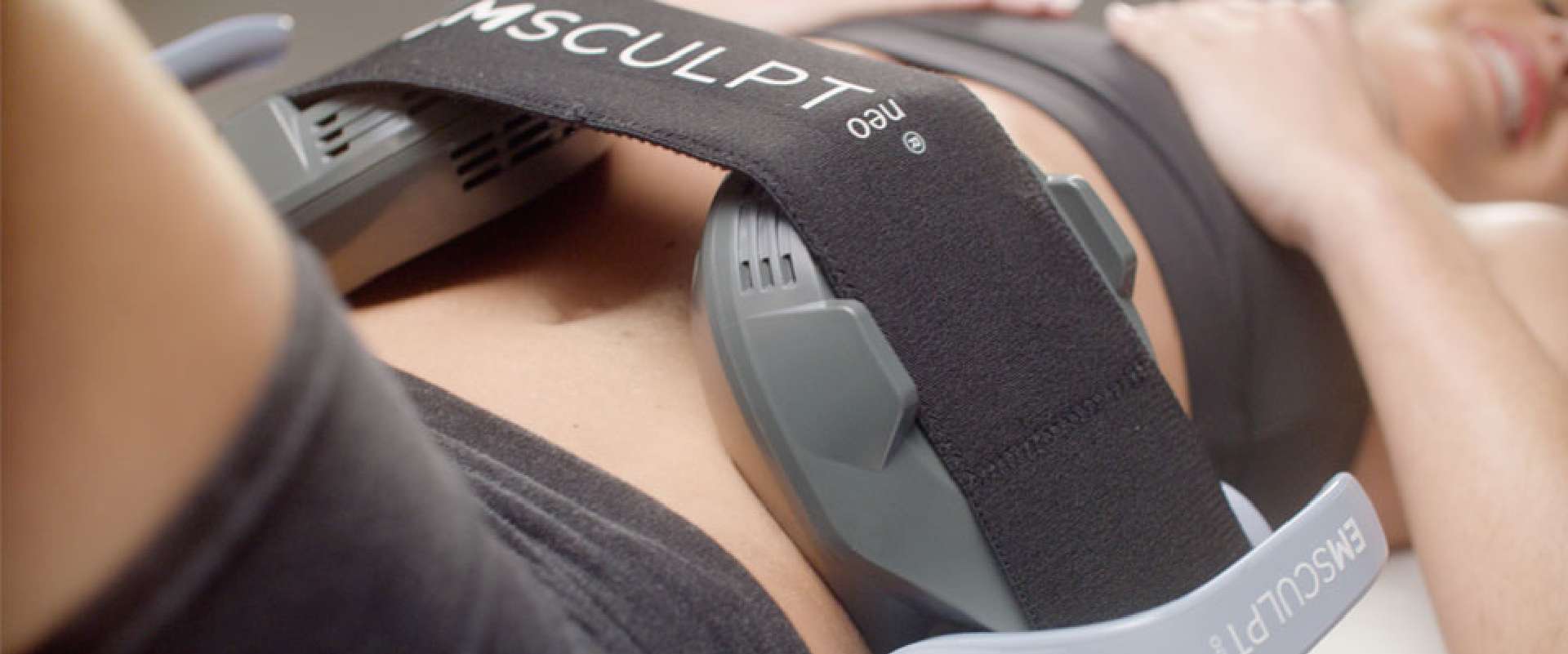 Photo of emsculpt in action on a patient